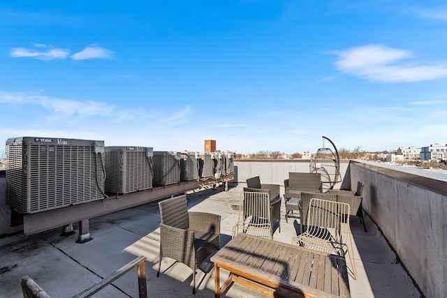 view of patio / terrace with a city view and an outdoor hangout area