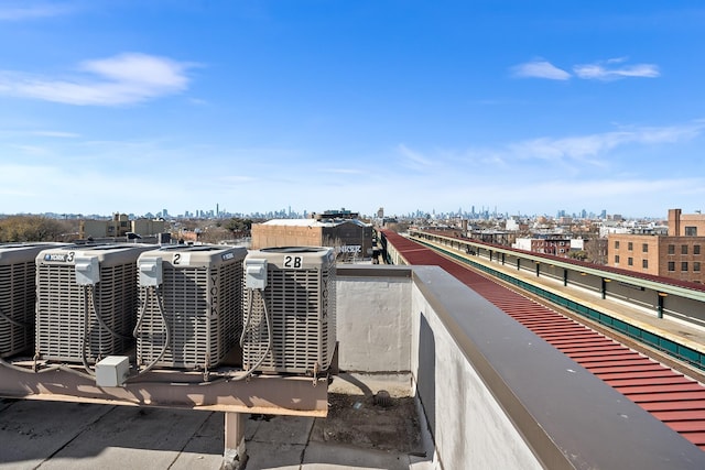 exterior space with a city view and central AC