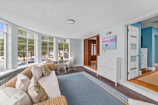 sunroom / solarium with visible vents