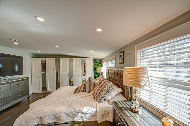 bedroom with dark wood-type flooring and recessed lighting