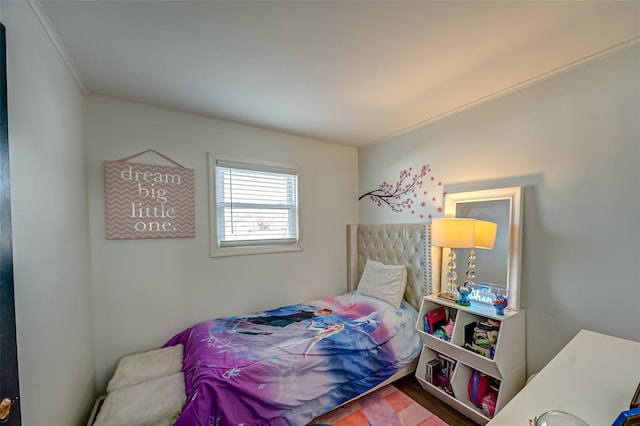 bedroom featuring crown molding