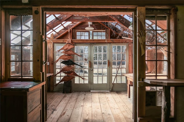 entryway featuring hardwood / wood-style flooring and french doors