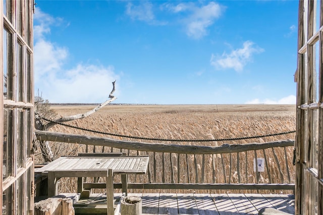 view of yard with a rural view