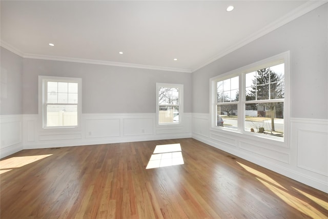 spare room with light wood-style flooring and recessed lighting