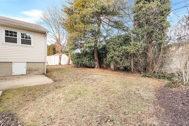 view of yard with fence