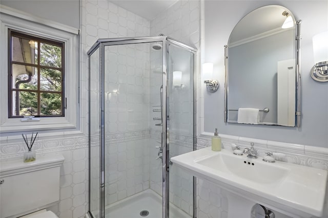 bathroom featuring a shower stall and toilet