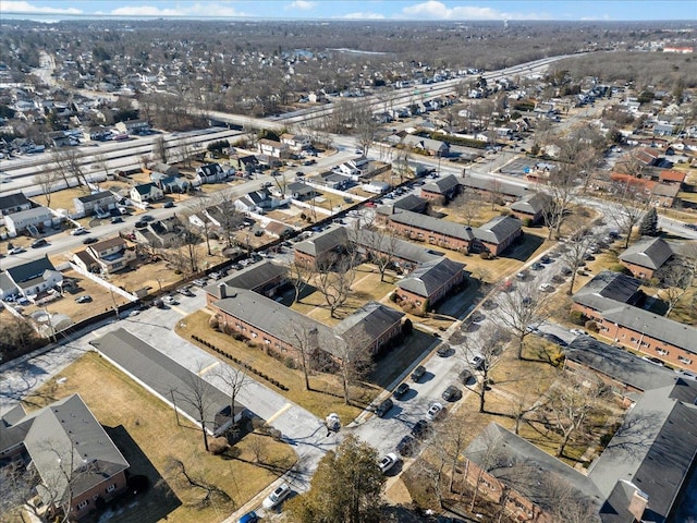 birds eye view of property with a residential view