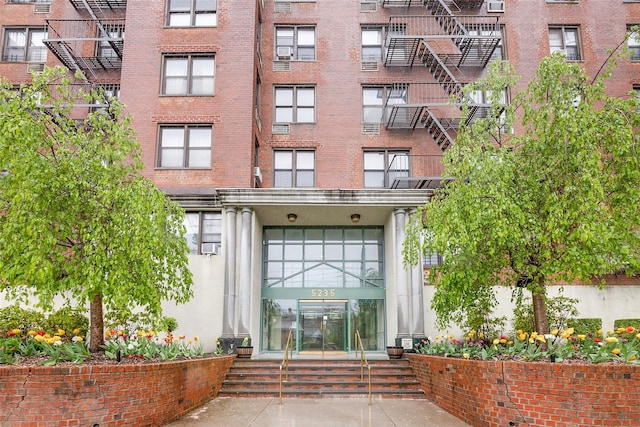 view of building exterior featuring entry steps