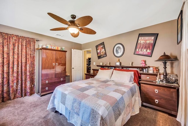 bedroom with light carpet, visible vents, and a ceiling fan