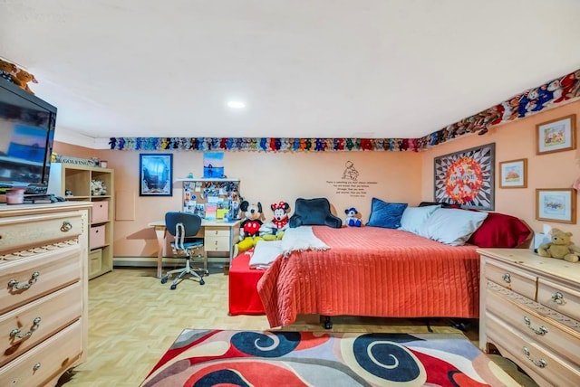 bedroom featuring a baseboard heating unit