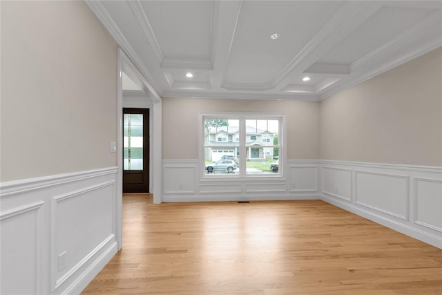 spare room with recessed lighting, beam ceiling, crown molding, and light wood finished floors