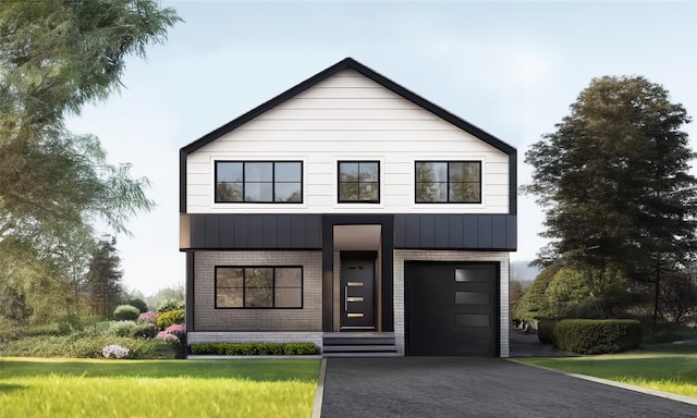 modern home featuring a front yard, brick siding, an attached garage, and driveway