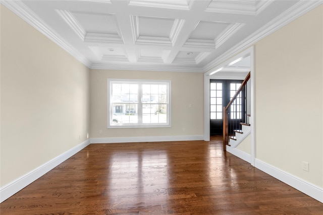 unfurnished room with dark wood-style flooring, coffered ceiling, stairs, baseboards, and ornamental molding