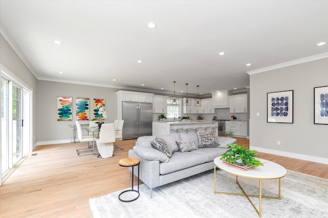 18 Anita Ave, Syosset, NY 11791 - living room featuring ornamental molding, recessed lighting, and light wood-type flooring