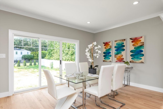 18 Anita Ave, Syosset, NY 11791 - dining space featuring healthy amount of natural light, light wood finished floors, recessed lighting, and ornamental molding
