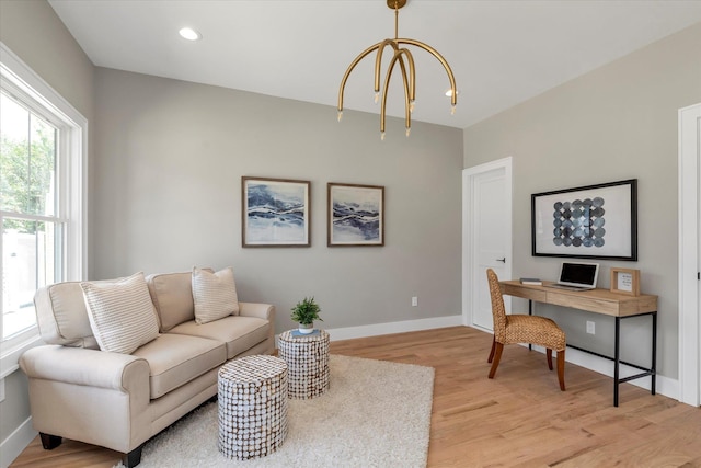 18 Anita Ave, Syosset, NY 11791 - living room featuring a chandelier, plenty of natural light, light wood-type flooring, and recessed lighting
