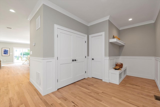 18 Anita Ave, Syosset, NY 11791 - hallway featuring crown molding, light wood-style flooring, wainscoting, and recessed lighting