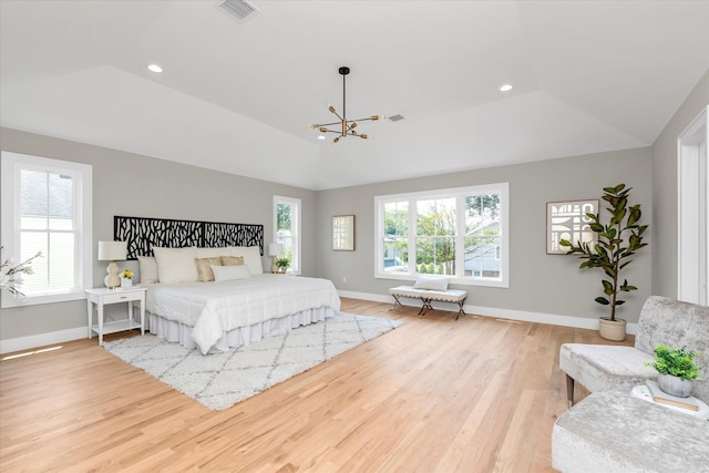 18 Anita Ave, Syosset, NY 11791 - bedroom featuring a chandelier, wood finished floors, multiple windows, lofted ceiling, and recessed lighting