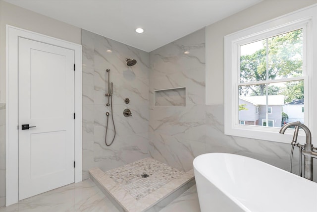 18 Anita Ave, Syosset, NY 11791 - full bathroom with marble finish floors, a freestanding tub, a marble finish shower, recessed lighting, and tile walls