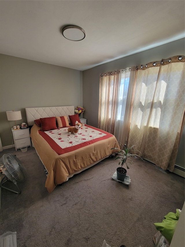 bedroom featuring a baseboard radiator and carpet flooring