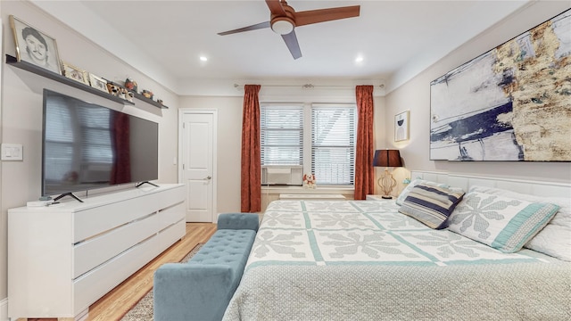 bedroom with a ceiling fan, recessed lighting, and light wood finished floors