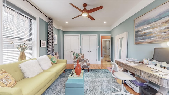 office featuring ceiling fan, wood finished floors, and recessed lighting