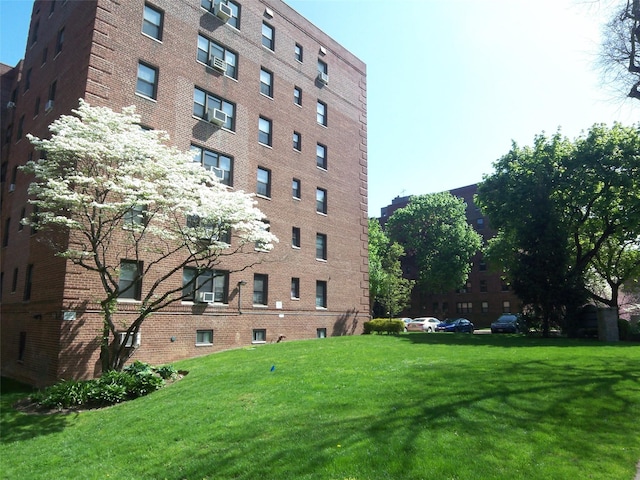 view of building exterior featuring cooling unit