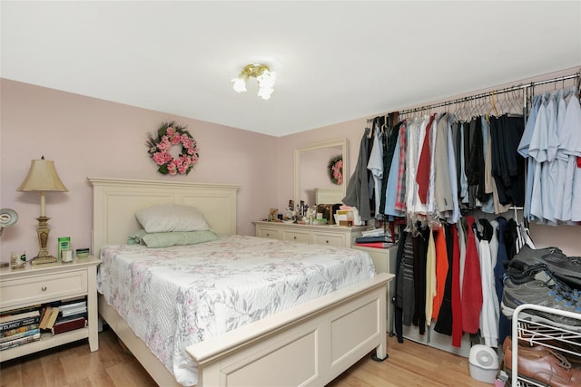 bedroom featuring light wood-type flooring