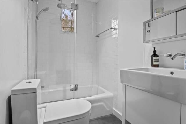 2737 Palisade Ave, Bronx, NY 10463 - full bath with toilet, vanity, and shower / bath combination with glass door