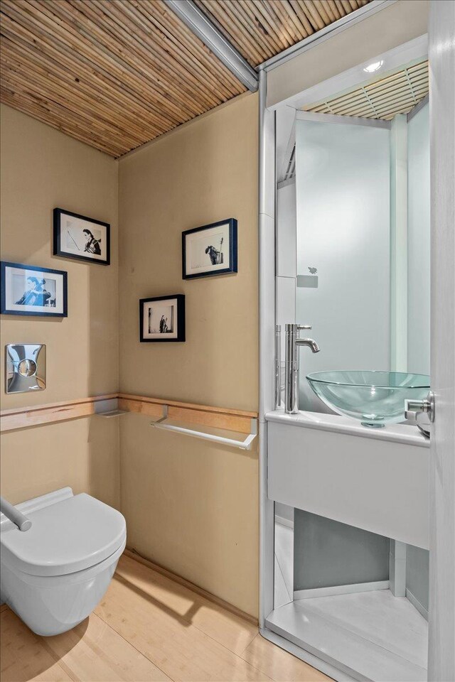 2737 Palisade Ave, Bronx, NY 10463 - bathroom featuring toilet and wood finished floors