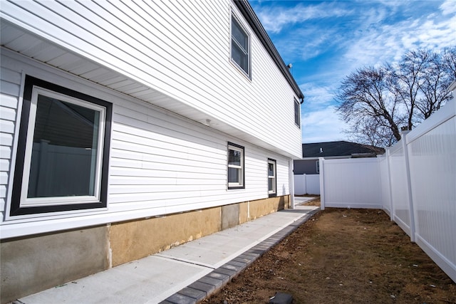 view of property exterior featuring a fenced backyard