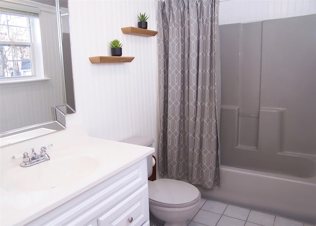 bathroom with toilet, shower / bathtub combination with curtain, vanity, and tile patterned floors