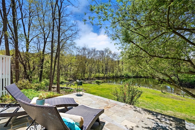 view of patio / terrace with a water view
