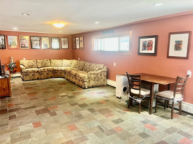 living area featuring a baseboard heating unit, ornamental molding, recessed lighting, and baseboards