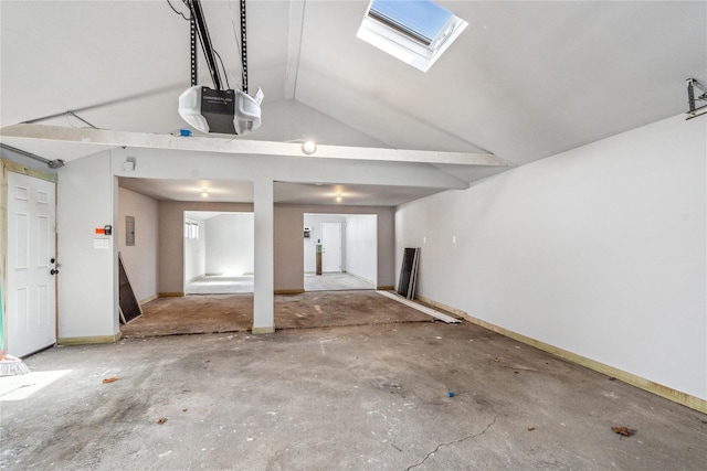 garage featuring baseboards and a garage door opener