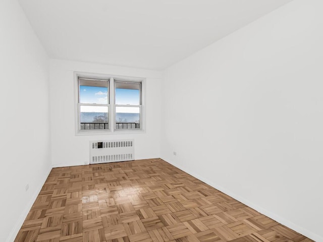 empty room featuring radiator