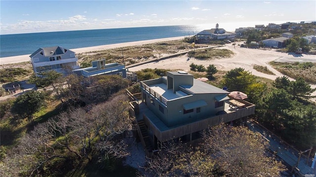 aerial view featuring a view of the beach and a water view