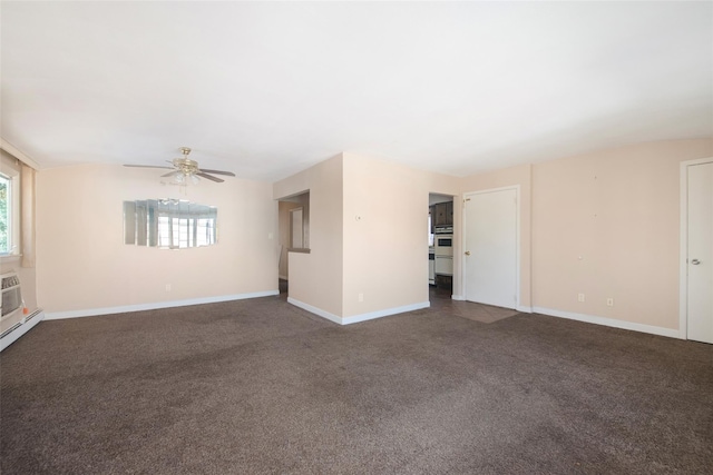 empty room with carpet, a wealth of natural light, and baseboards