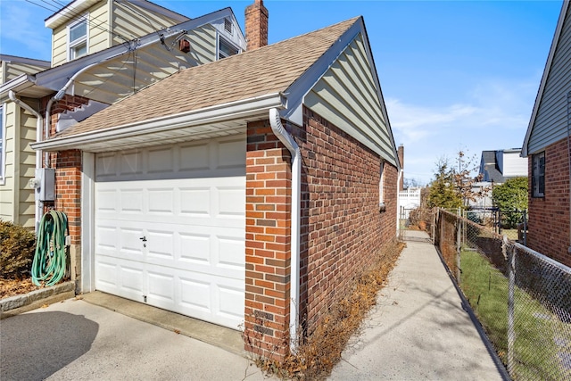 garage with fence