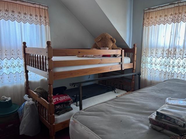 bedroom with vaulted ceiling