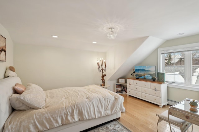 bedroom featuring recessed lighting, light wood-style flooring, and vaulted ceiling