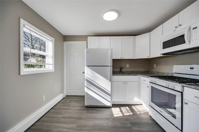 kitchen featuring a baseboard radiator, white appliances, white cabinets, and a sink