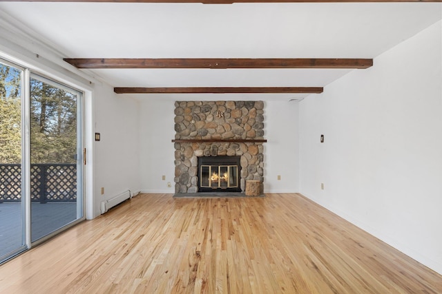 unfurnished living room with a baseboard radiator, beam ceiling, a stone fireplace, and wood finished floors