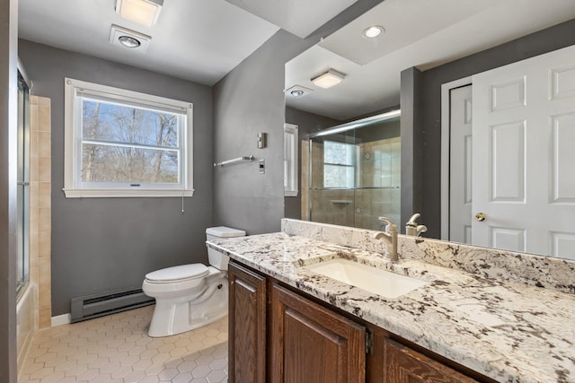 bathroom with toilet, tile patterned floors, vanity, a baseboard heating unit, and recessed lighting