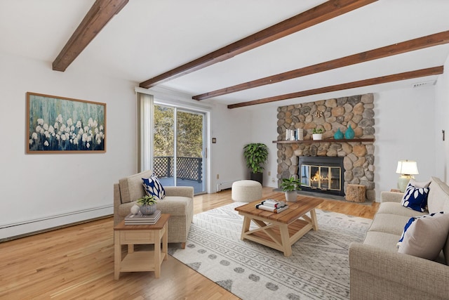 living room featuring a baseboard heating unit, a fireplace, wood finished floors, baseboard heating, and beam ceiling