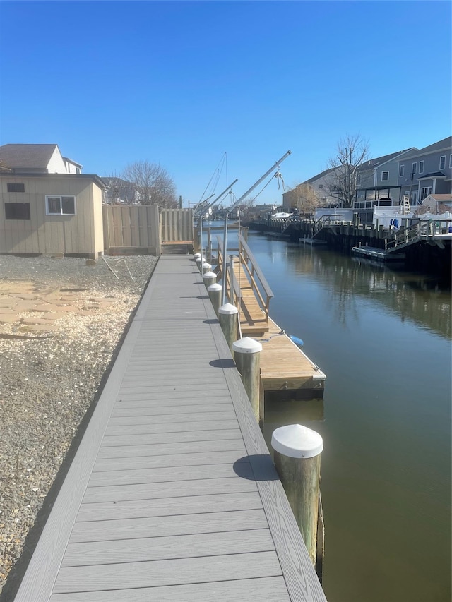 dock area featuring a water view