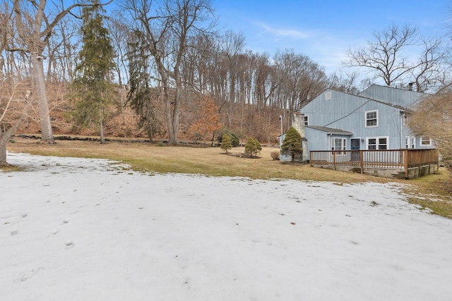 view of yard featuring a wooden deck