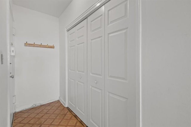 hall featuring tile patterned floors