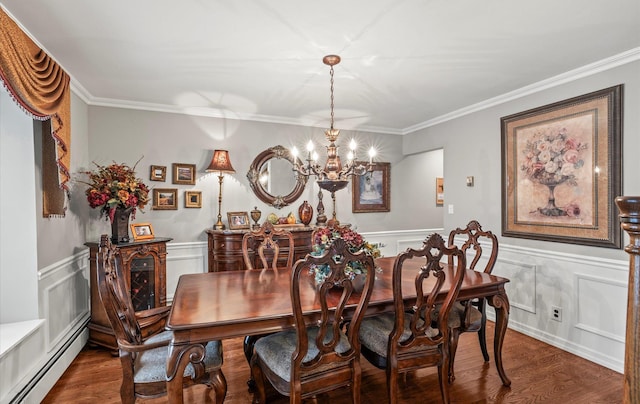 dining space with a baseboard heating unit, crown molding, and dark wood finished floors