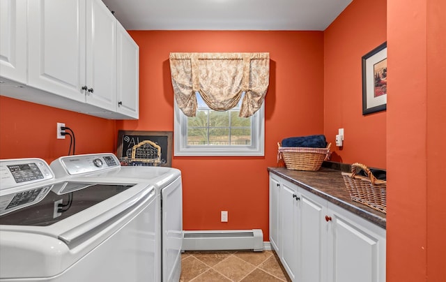 laundry area featuring baseboard heating, washer and clothes dryer, cabinet space, and baseboards